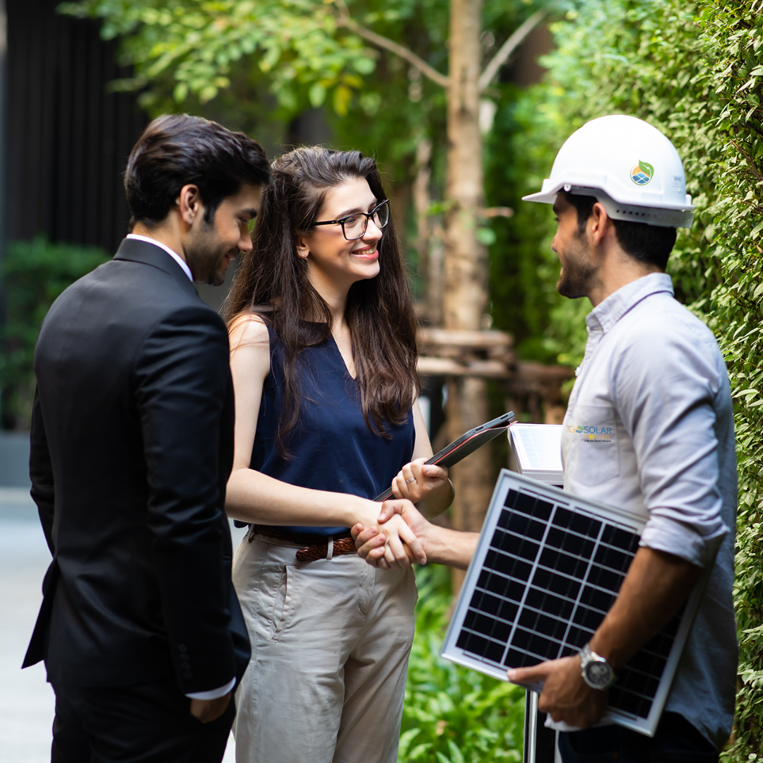 Customers greeting a go solar service specialist